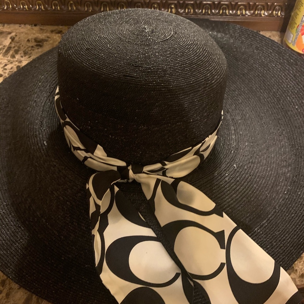 Black and white coach sun hat.